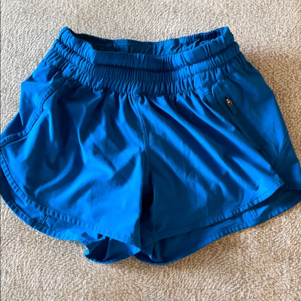 Blue Lululemon shorts with front zipper